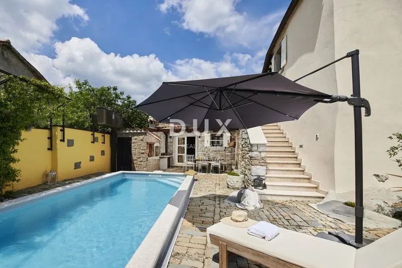 Pool with sunbeds