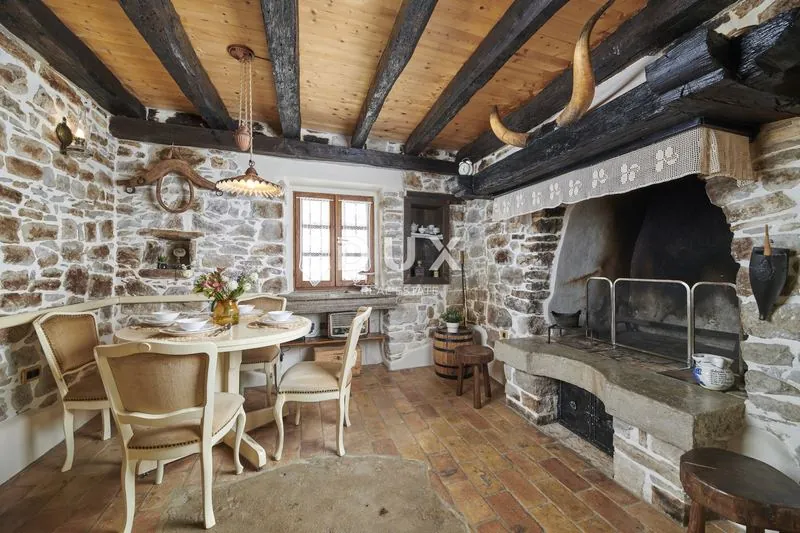 Historic dining room with stone fireplace